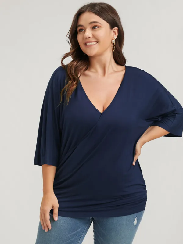 Solid Gathered Button Dolman Sleeve Wrap Modal T-shirt sold by Bloomchic
