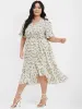Ditsy Floral Arc Hem Ruffled Wrap Dress sold by Bloomchic