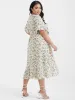 Ditsy Floral Arc Hem Ruffled Wrap Dress sold by Bloomchic