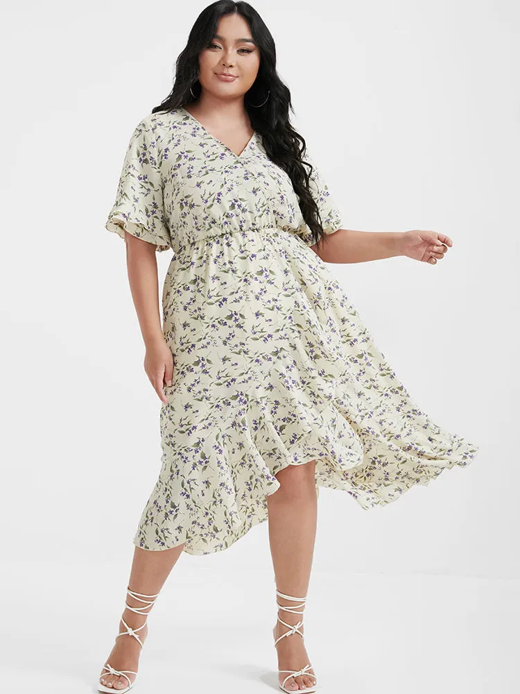 Ditsy Floral Arc Hem Ruffled Wrap Dress sold by Bloomchic