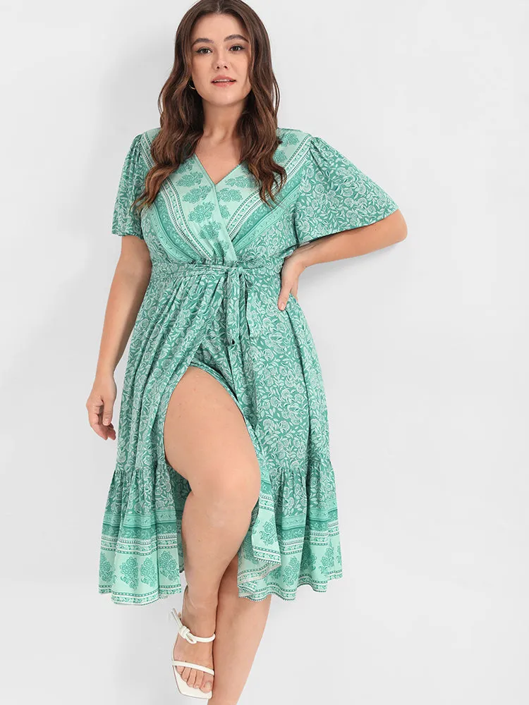 Ditsy Floral Ruffled Knotted Wrap Dress sold by Bloomchic