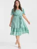 Ditsy Floral Ruffled Knotted Wrap Dress sold by Bloomchic