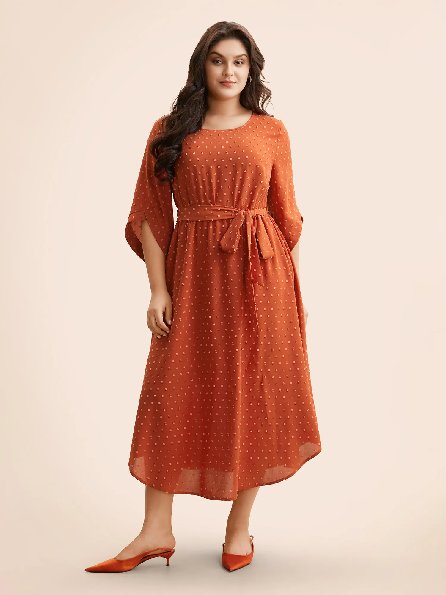 Textured Bell Sleeve Belted Arc Hem Dress sold by Bloomchic product image thumbnail 2