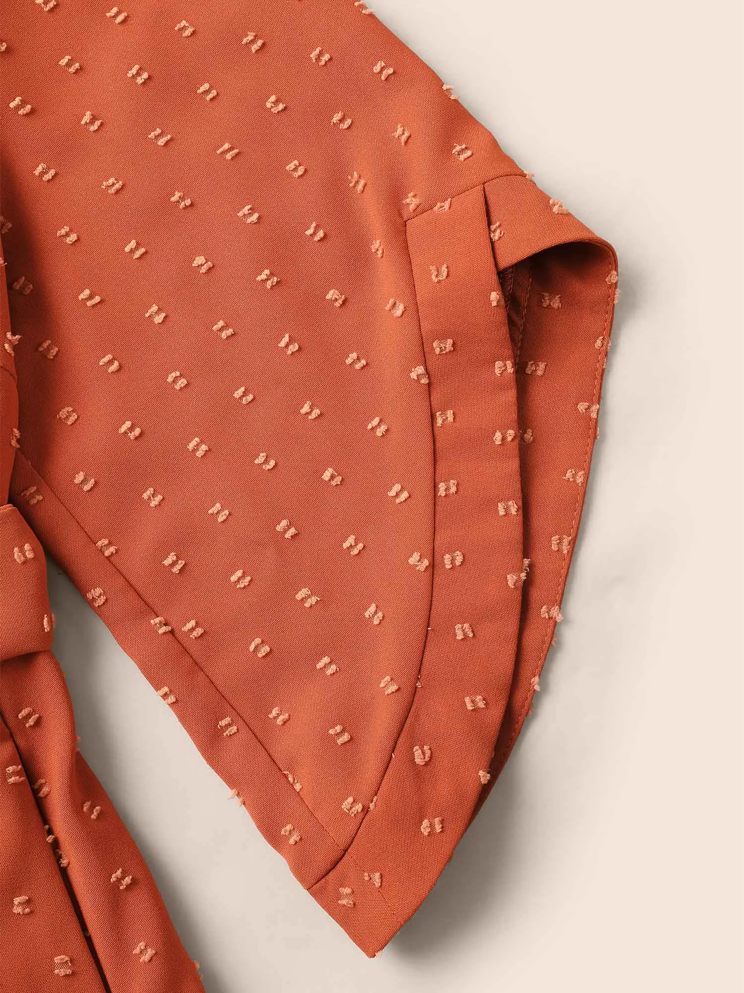 Textured Bell Sleeve Belted Arc Hem Dress sold by Bloomchic product image thumbnail 5