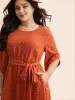 Textured Bell Sleeve Belted Arc Hem Dress sold by Bloomchic