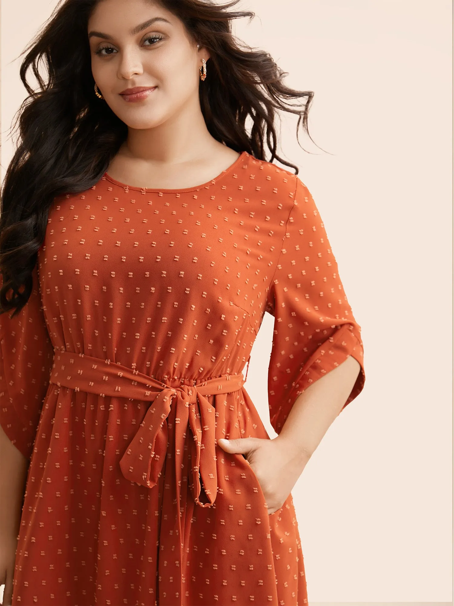 Textured Bell Sleeve Belted Arc Hem Dress sold by Bloomchic product image thumbnail 4
