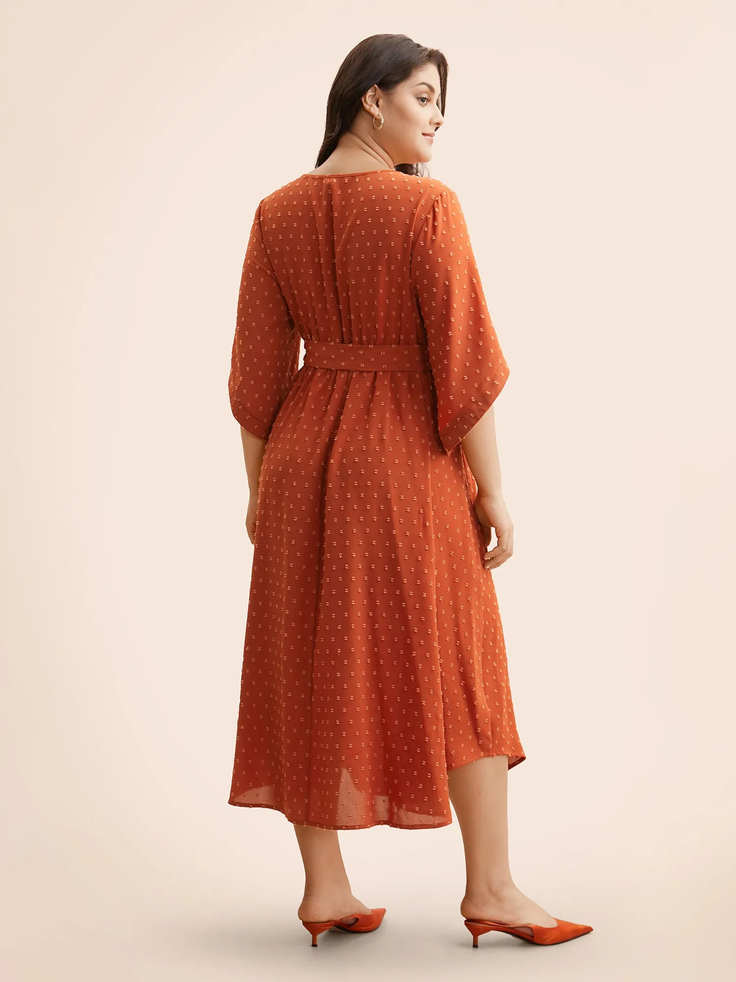 Textured Bell Sleeve Belted Arc Hem Dress sold by Bloomchic product image thumbnail 3
