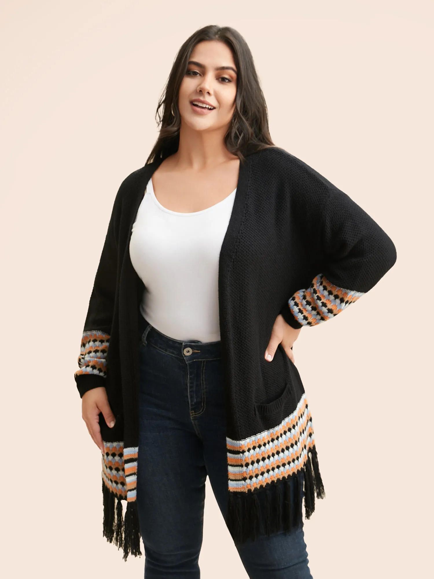 Geometric Tassel Trim Lantern Sleeve Cardigan sold by Bloomchic