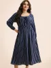 Striped Shirred Lantern Sleeve Maxi Dress sold by Bloomchic