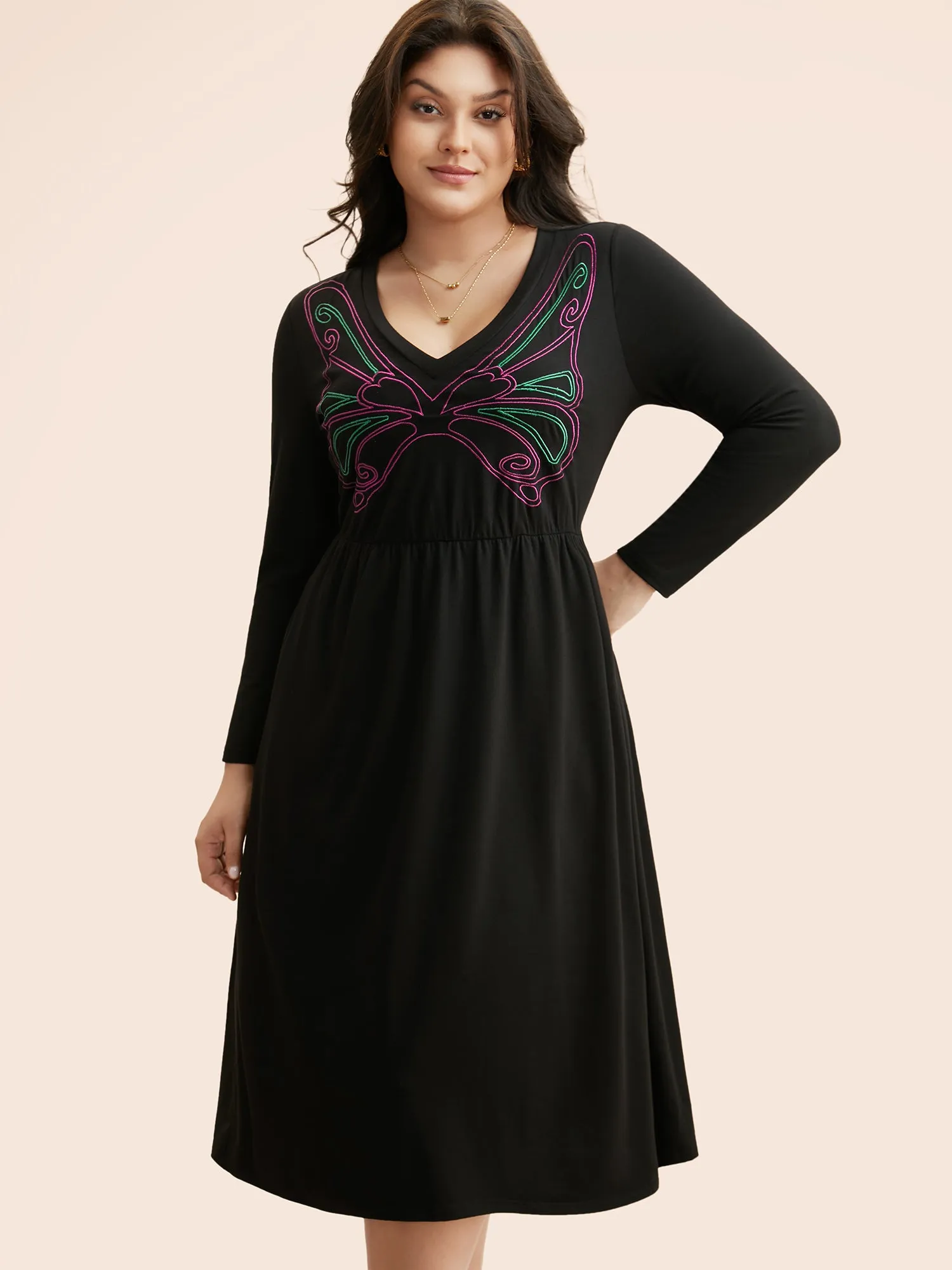 Butterfly Embroidered V Neck Midi Dress sold by Bloomchic