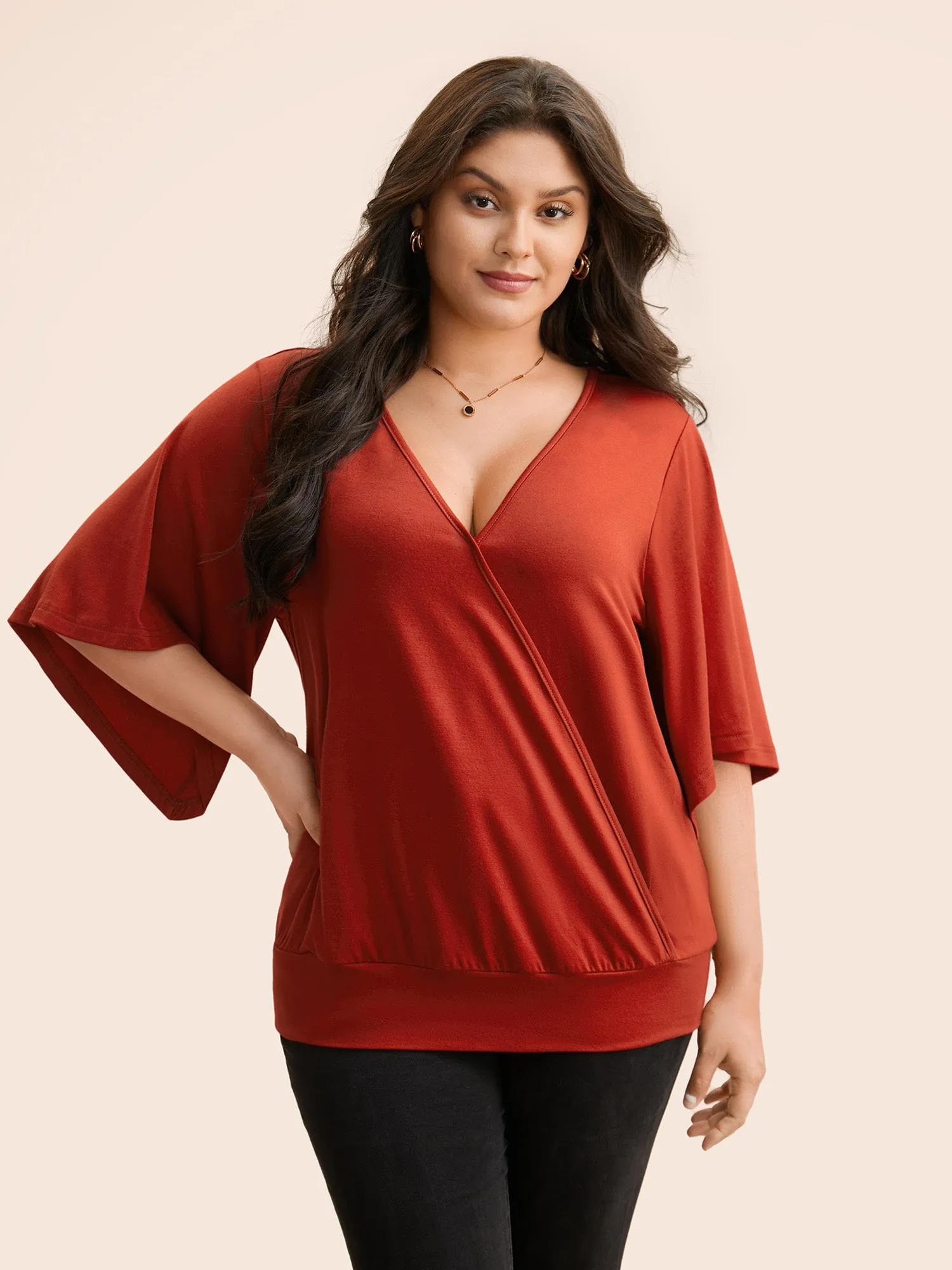 Solid Wrap Flutter Sleeve T-shirt sold by Bloomchic