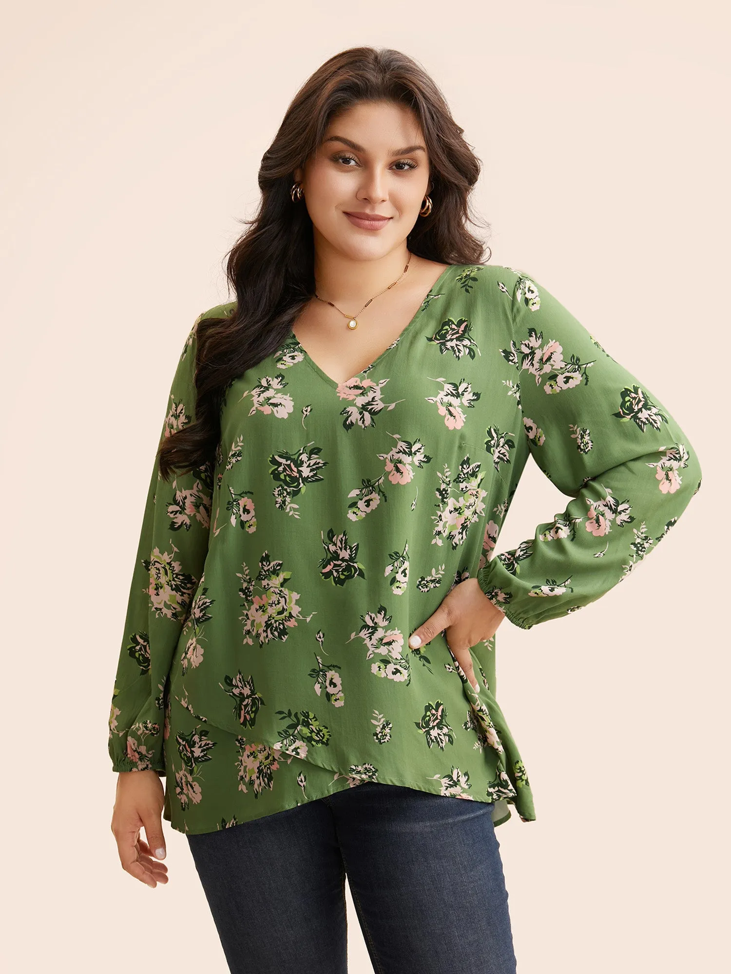 Floral Overlapping Asymmetrical Hem Blouse sold by Bloomchic