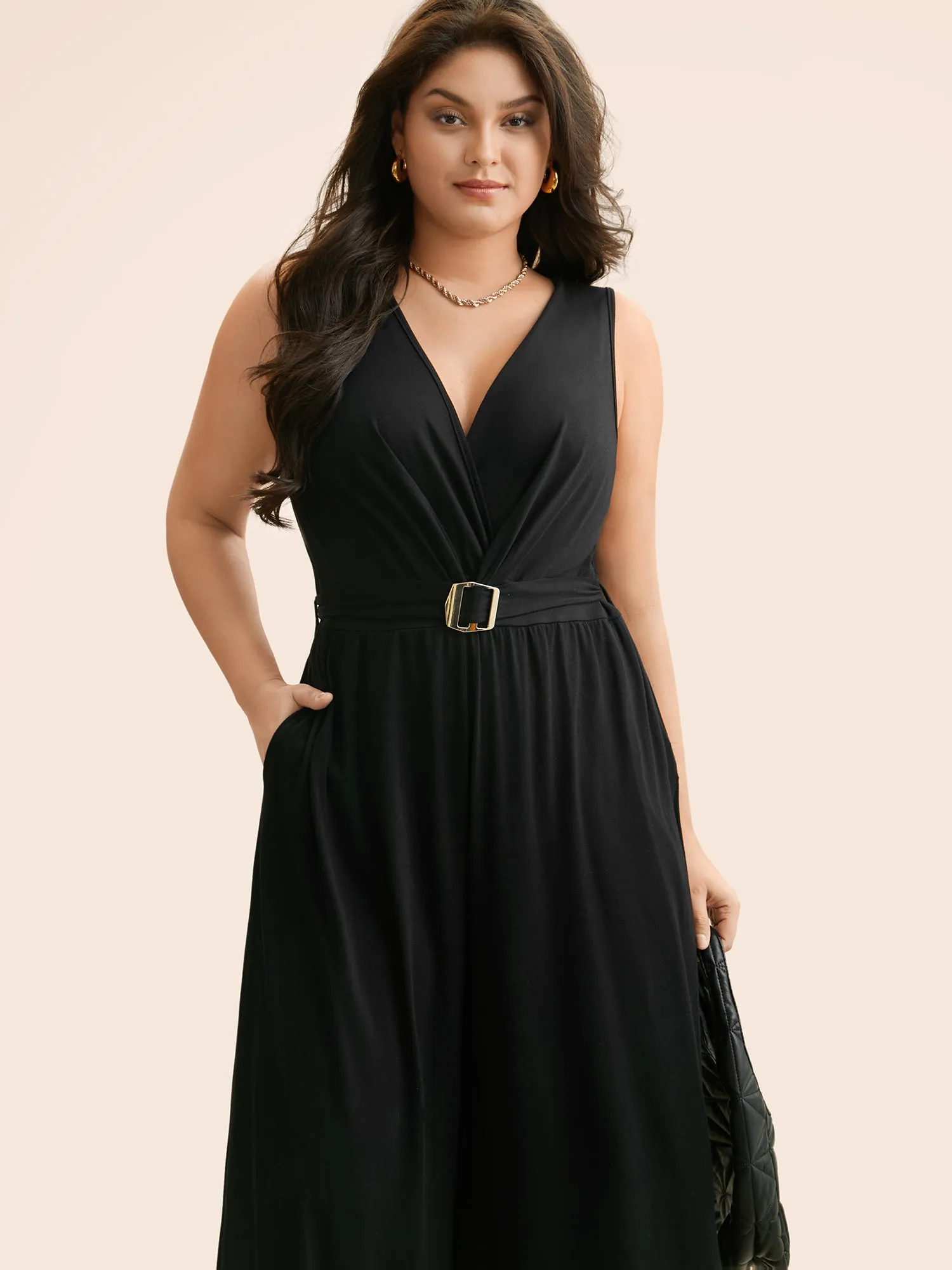 Overlap Collar Metal Detail Belted Jumpsuit sold by Bloomchic product image thumbnail 2