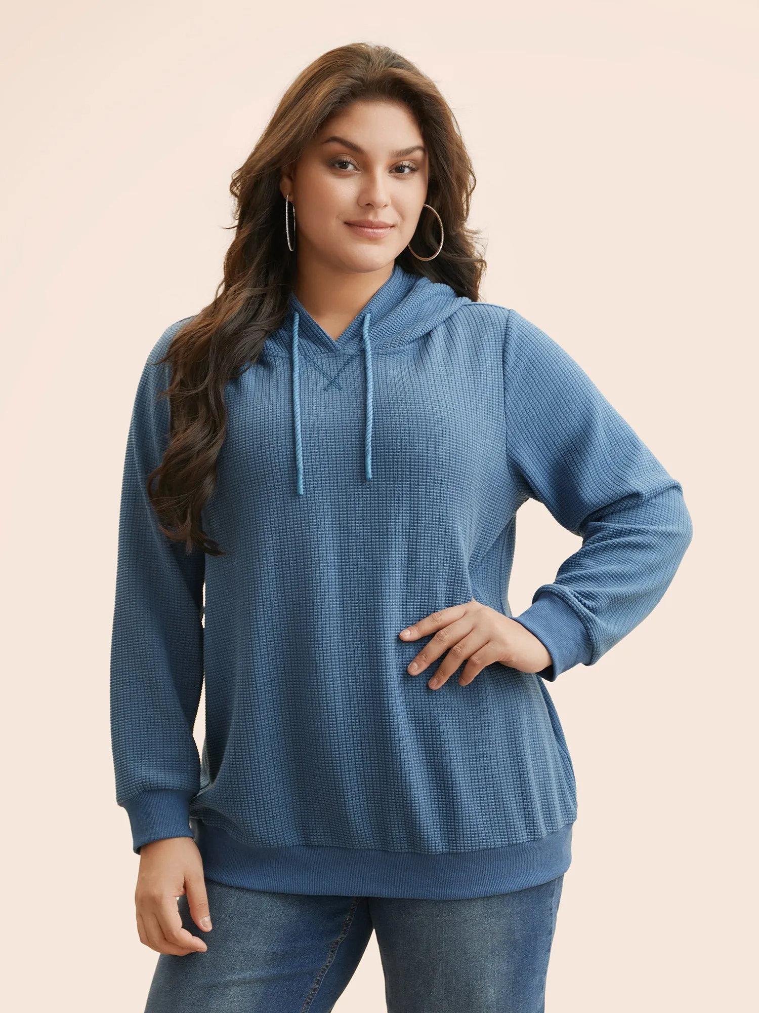 Plain Textured Hooded Drawstring Sweatshirt sold by Bloomchic