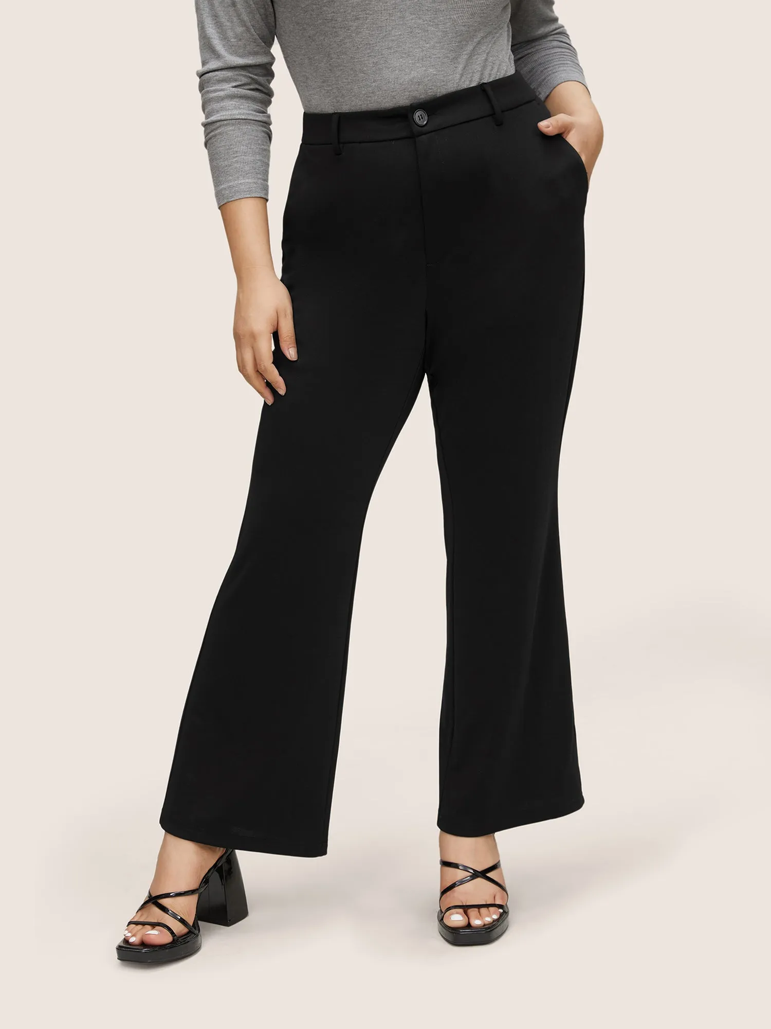Solid High Rise Slant Pocket Flare Leg Pants sold by Bloomchic