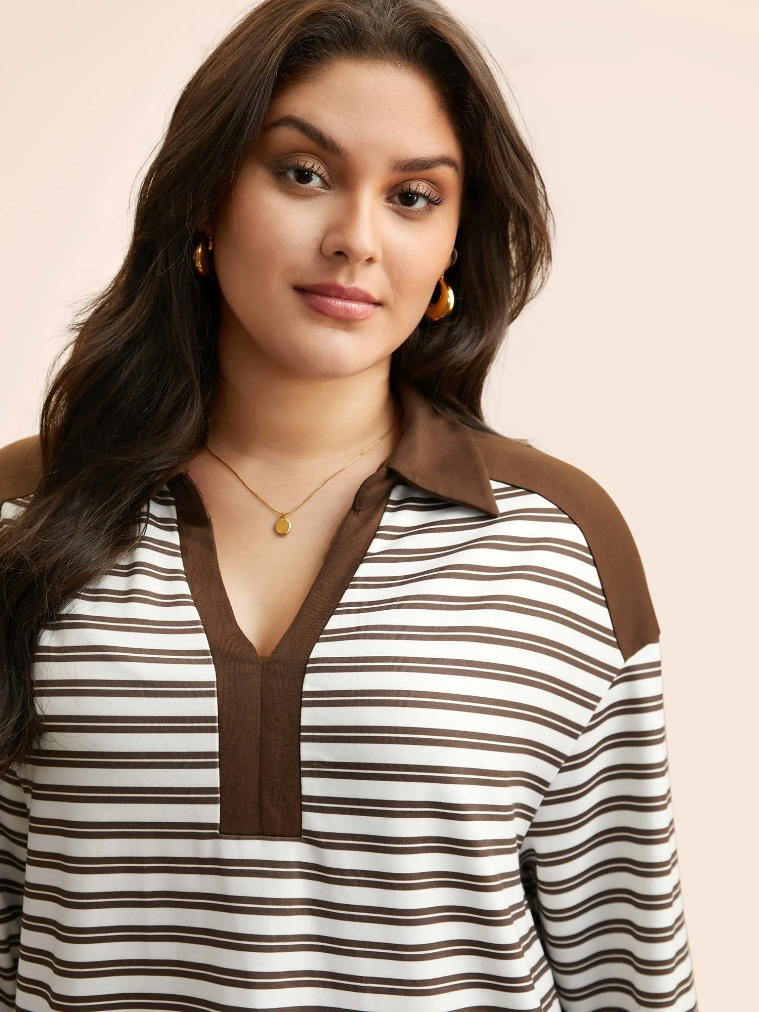 Striped Patchwork Arc Hem Sweatshirt sold by Bloomchic product image thumbnail 4