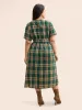 Round Neck Plaid Belted Midi Dress sold by Bloomchic