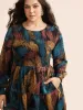 Feather Print Shirred Lantern Sleeve Dress sold by Bloomchic