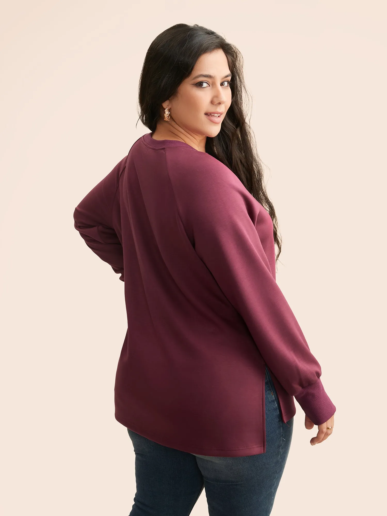 Solid Raglan Sleeve Slit Hem Sweatshirt sold by Bloomchic product image thumbnail 3