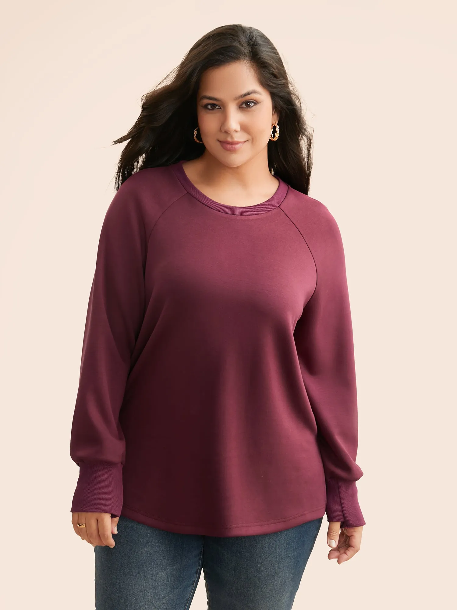 Solid Raglan Sleeve Slit Hem Sweatshirt sold by Bloomchic