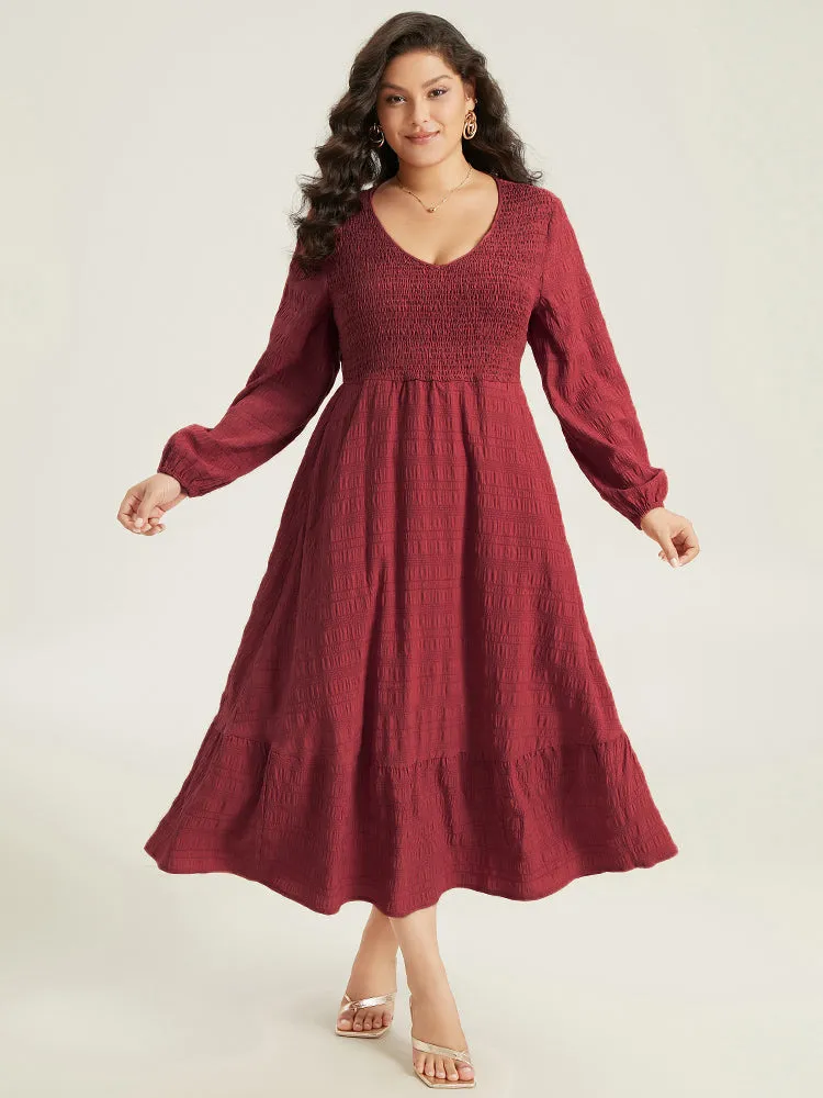 Solid Shirred Plisse Flutter Hem Dress sold by Bloomchic