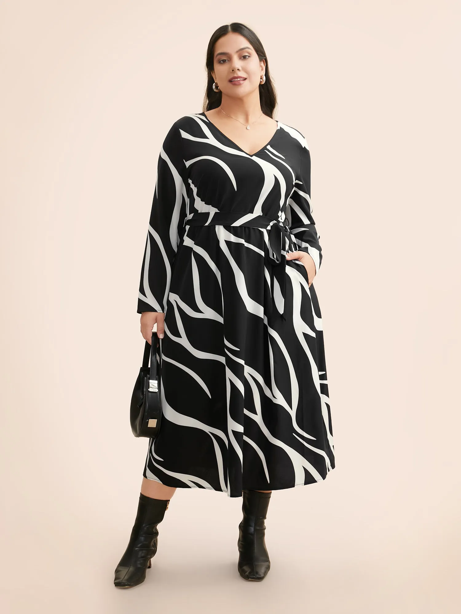V Neck Geometric Belted Dress sold by Bloomchic