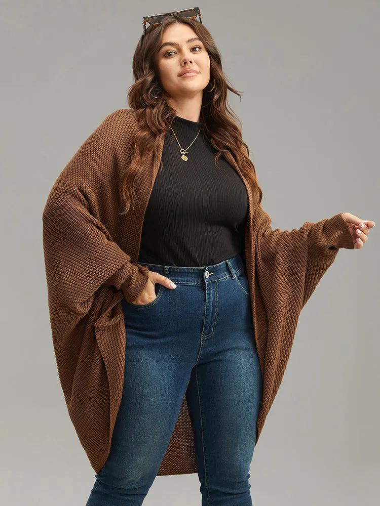 Solid Dolman Sleeve Arc Hem Cardigan sold by Bloomchic