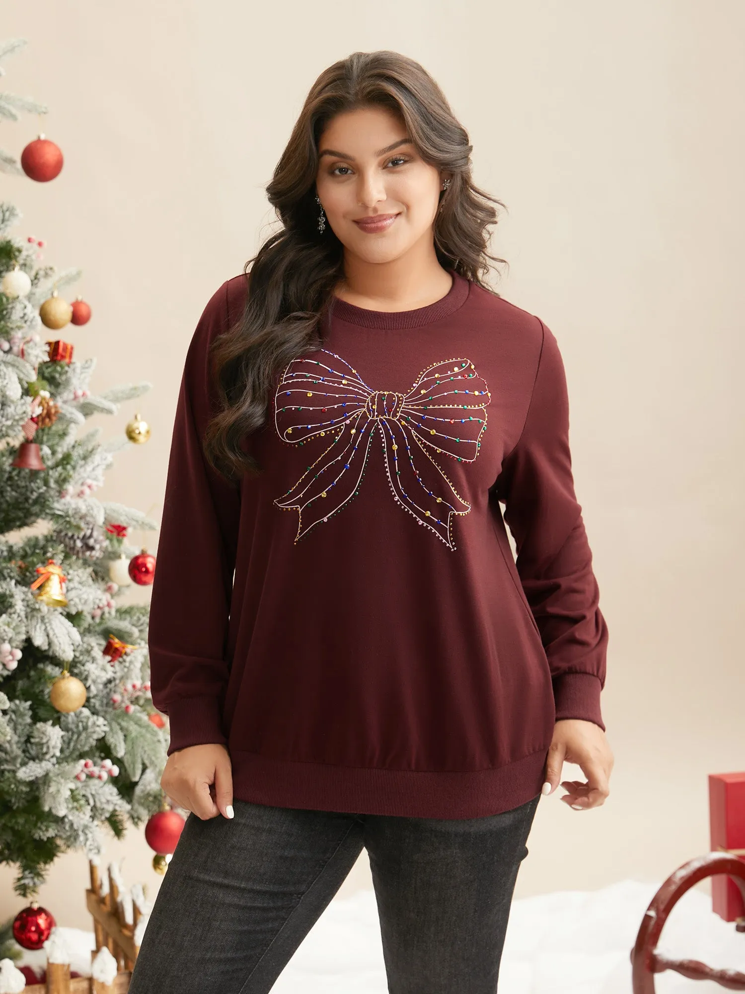 Rhinestone Embellished Bow Straight-Fit Sweatshirt sold by Bloomchic