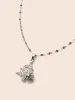 Silver Holiday Tree Pendant Necklace sold by Bloomchic