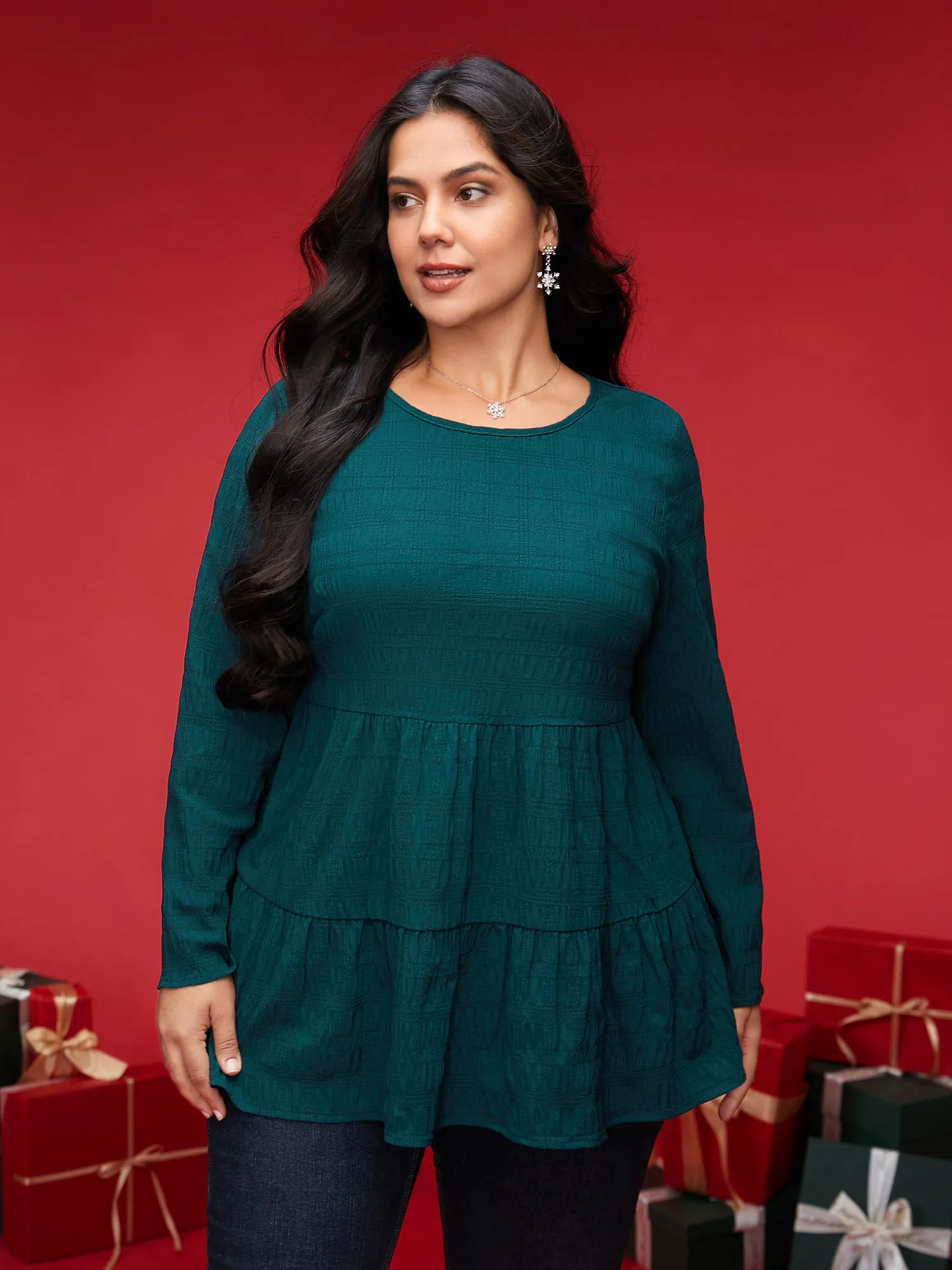 Textured Round Neck Tiered Hem Blouse sold by Bloomchic