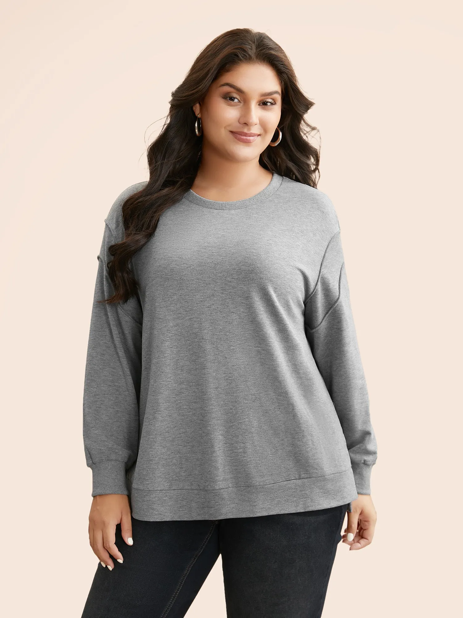 Round Neck Tucked Seam Slit Hem Sweatshirt sold by Bloomchic