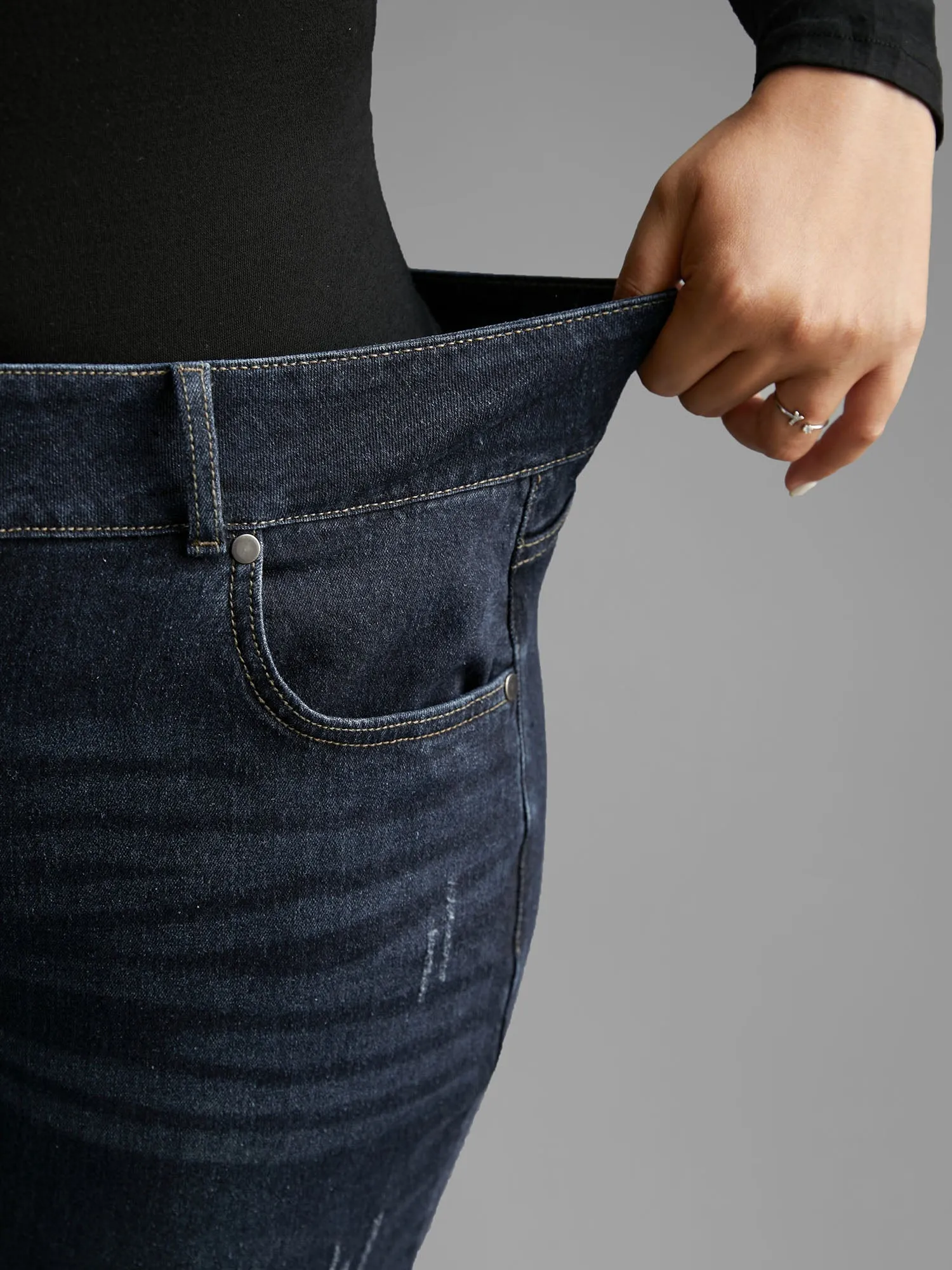 Dark Wash Button Up Skinny Jeans sold by Bloomchic product image thumbnail 4