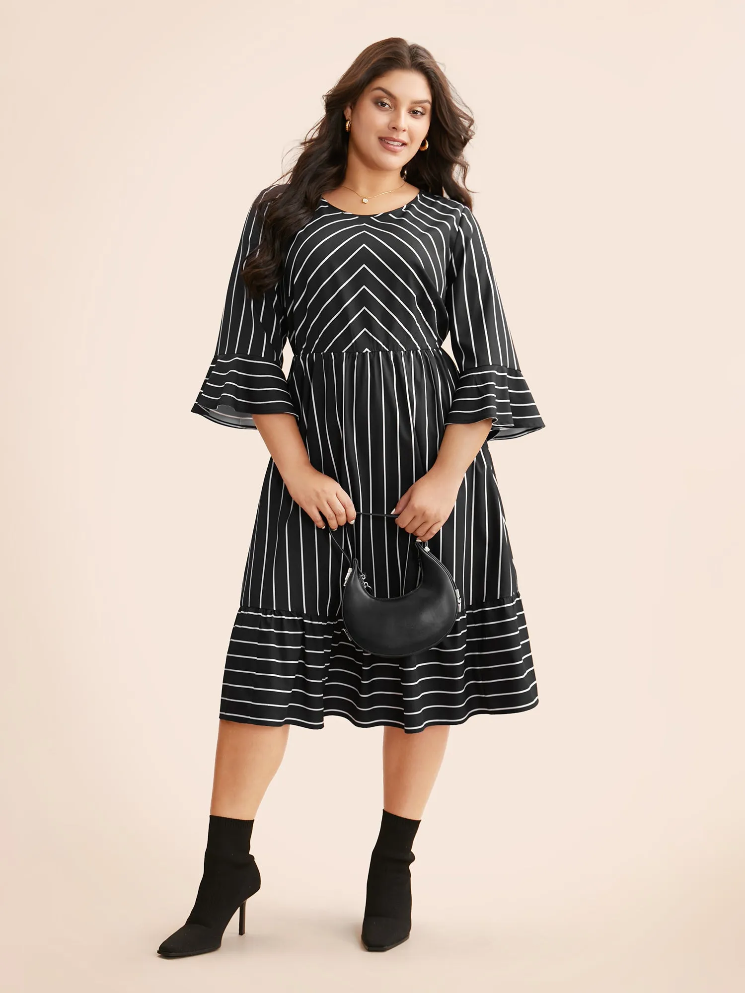 Striped Flutter Sleeve Midi Dress sold by Bloomchic