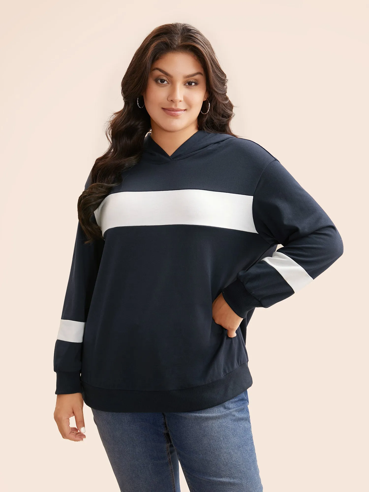 Contrast Patchwork Hooded Sweatshirt sold by Bloomchic