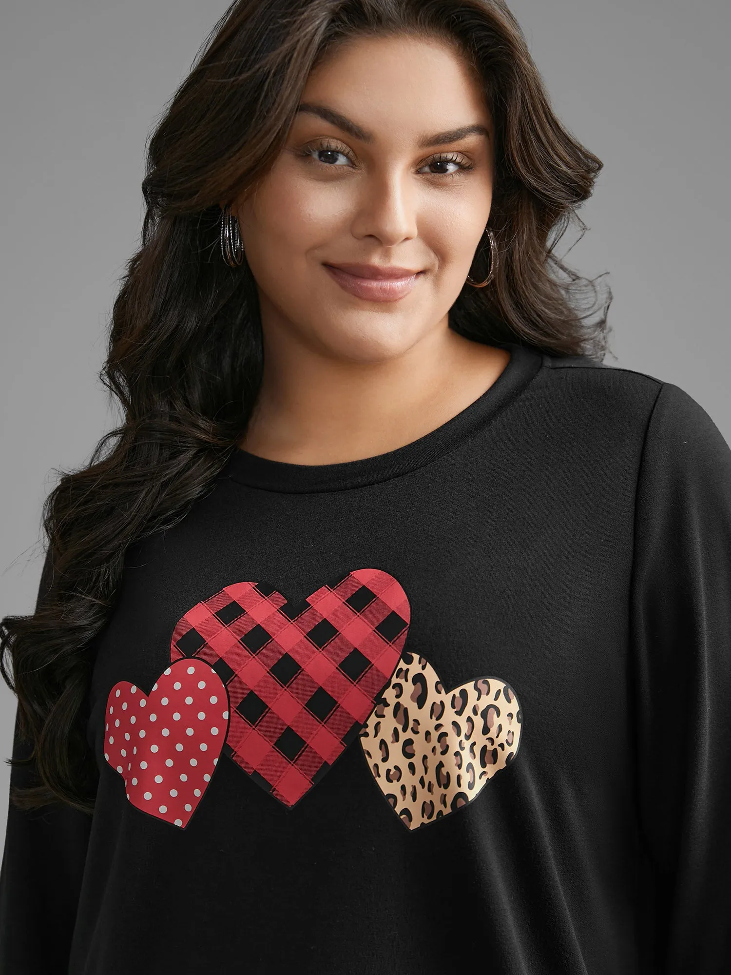Crew Neck Heart Print Sweatshirt sold by Bloomchic