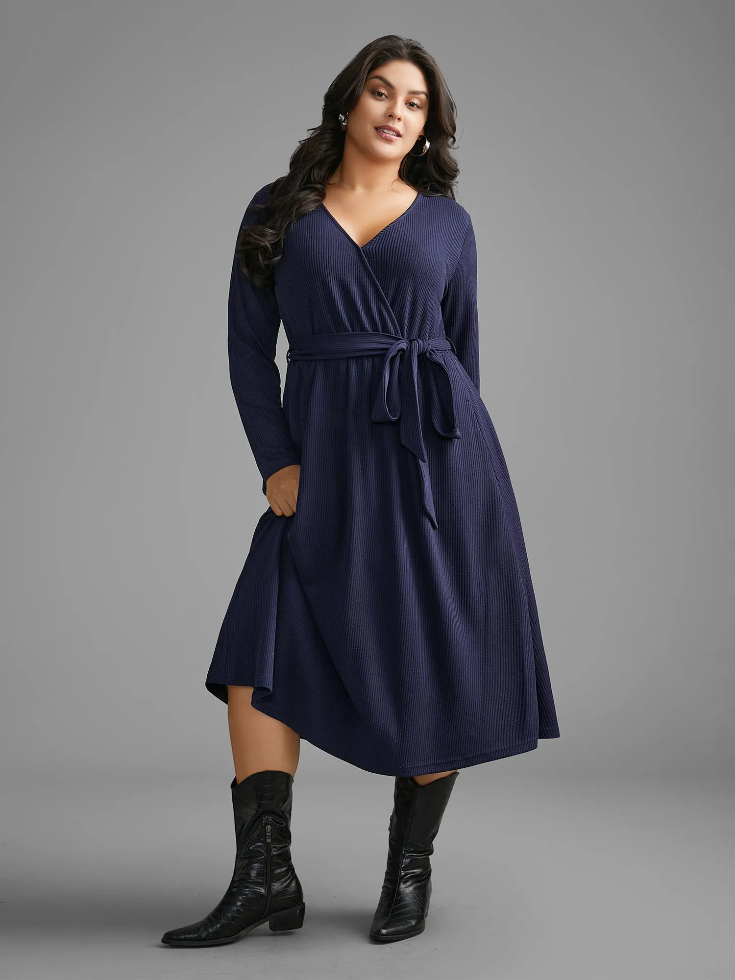 Solid Overlap Collar Belted Knit Dress sold by Bloomchic