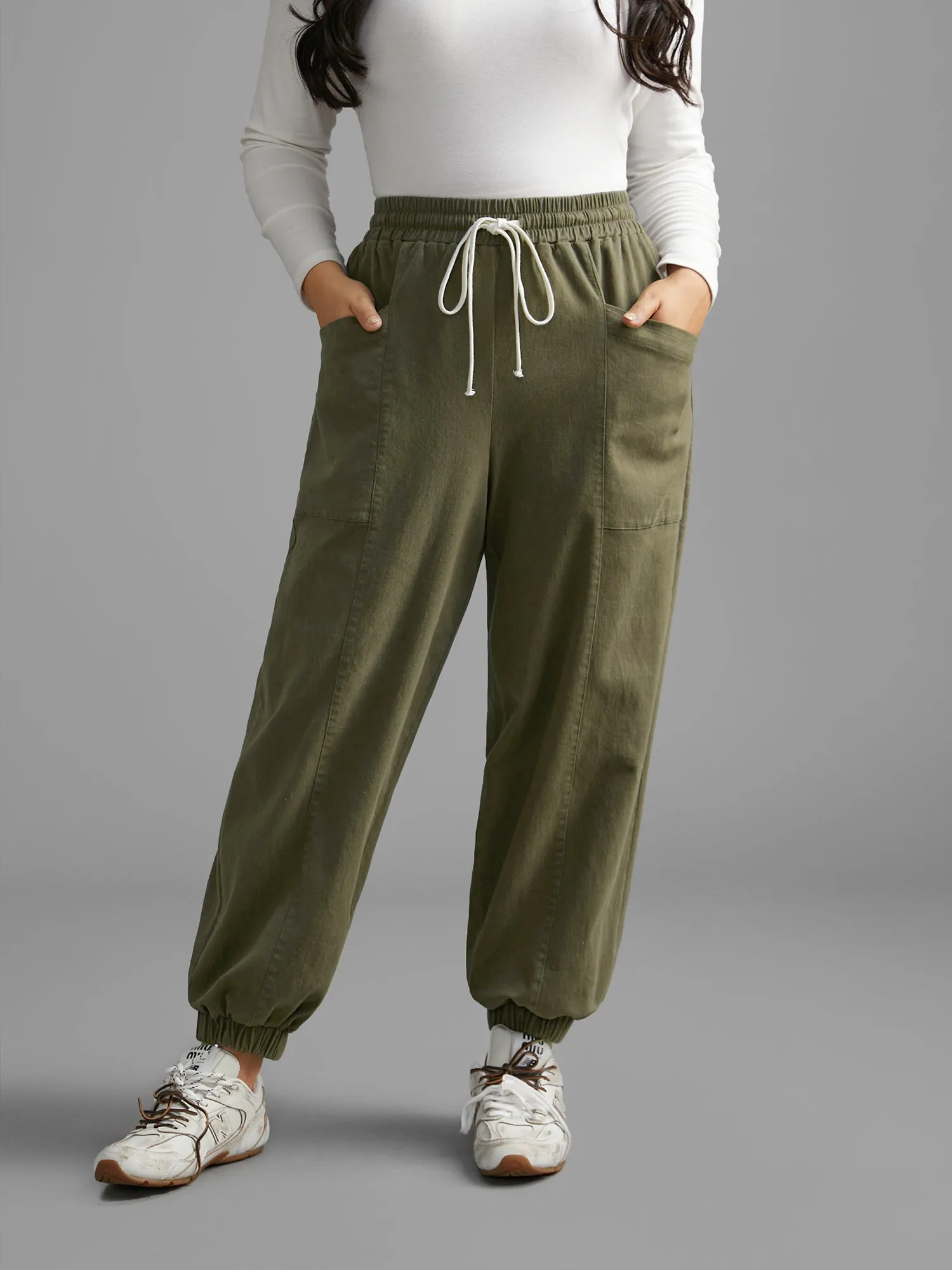 Solid Drawstring Patch Pocket Carrot Pants sold by Bloomchic