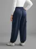 Mid Rise Patched Pocket Carrot Pants sold by Bloomchic