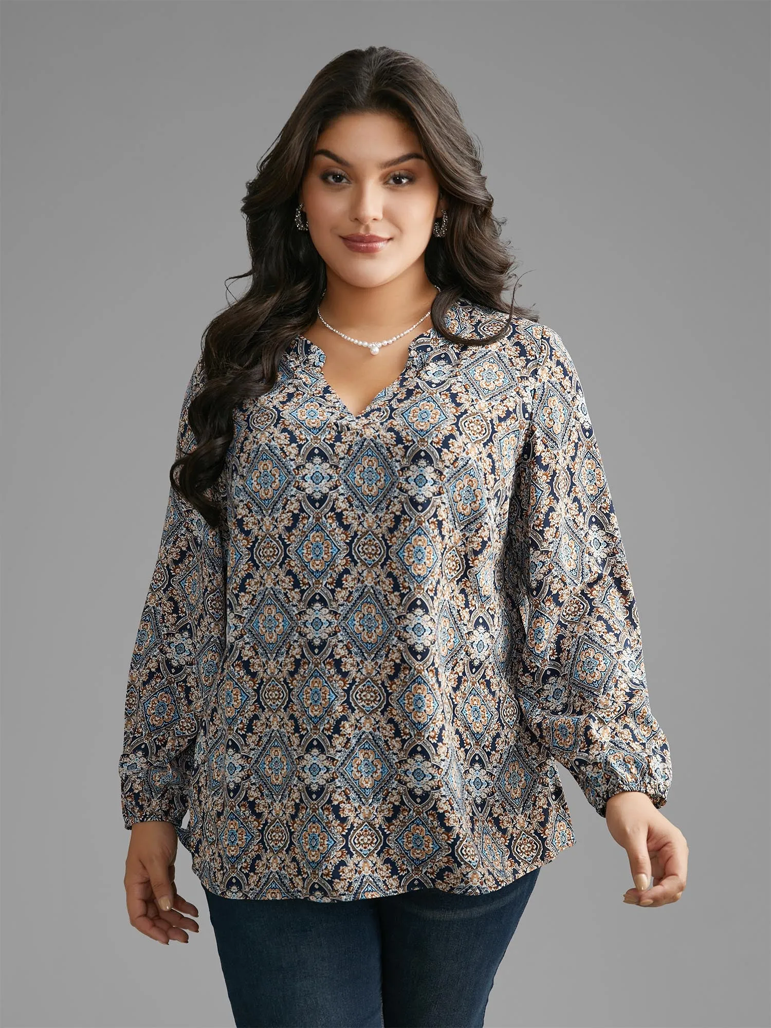 Boho Print Notched Collar Slit Hem Blouse sold by Bloomchic