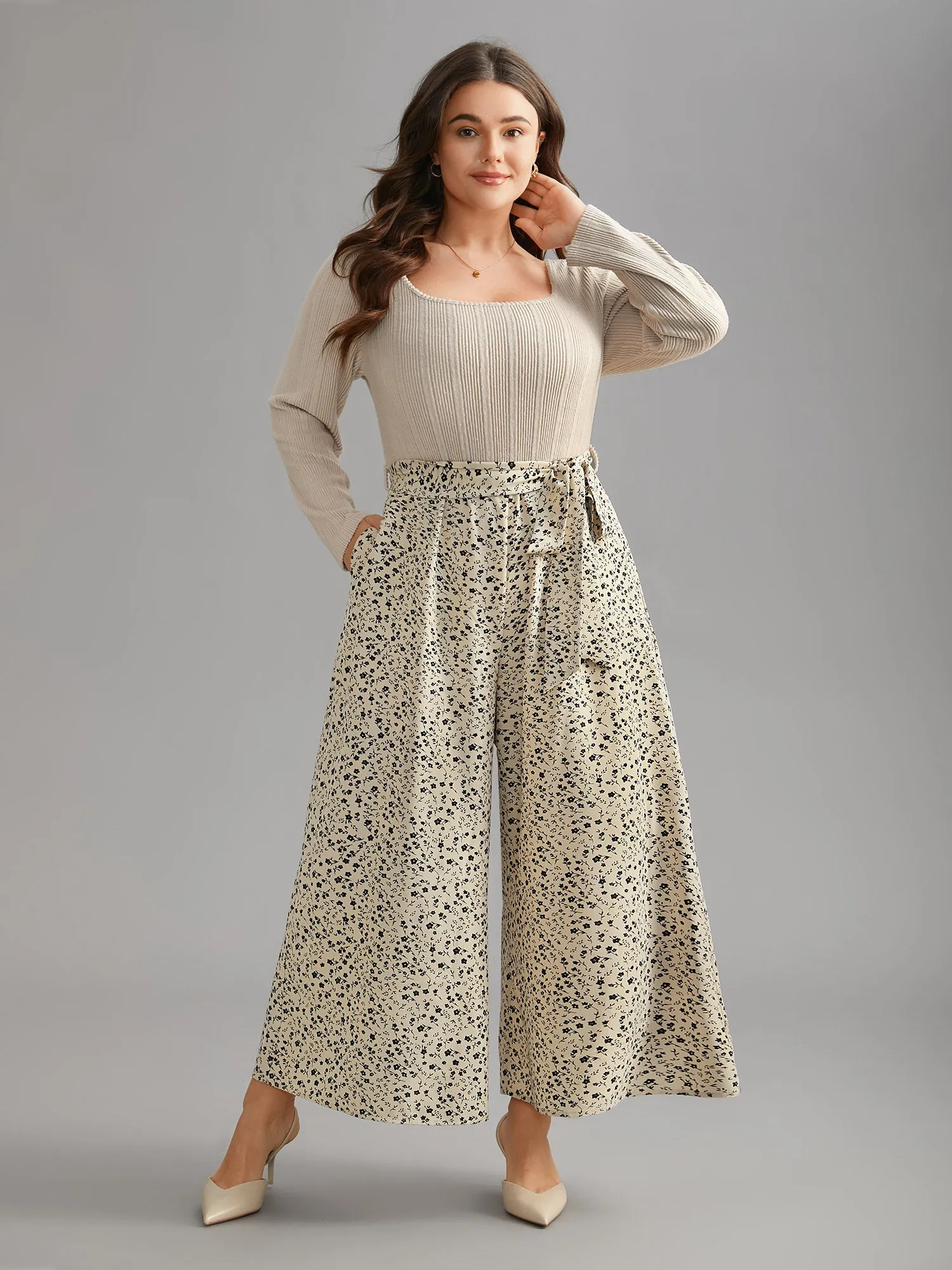 Textured Square Neck Belted Floral Jumpsuit sold by Bloomchic