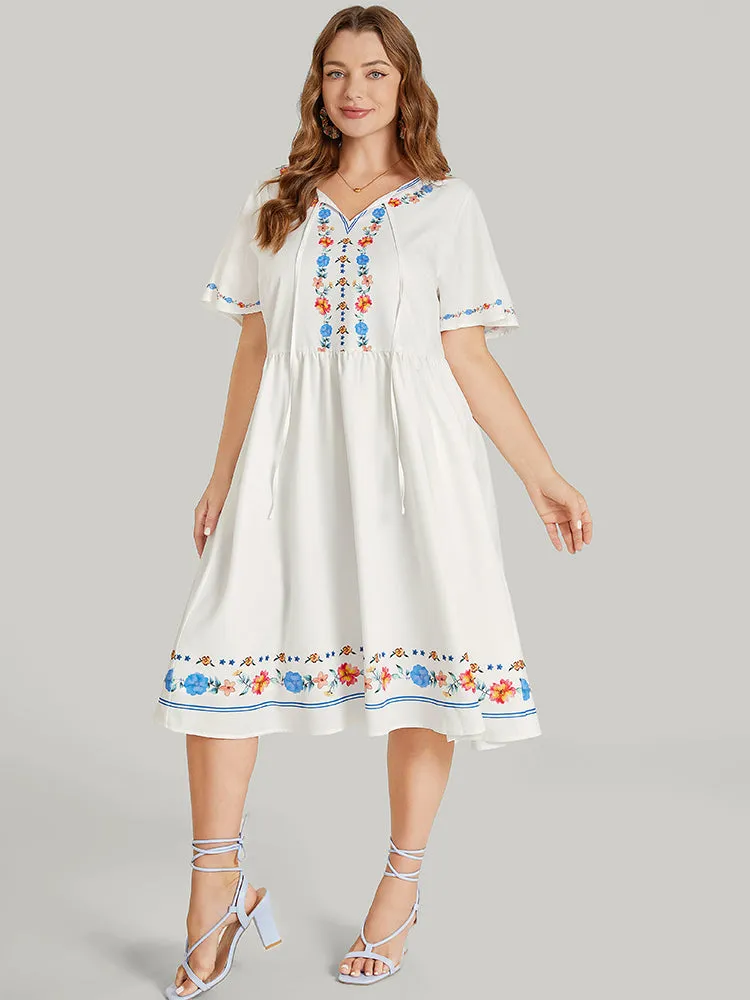 Floral Print Ruffle Sleeve Tie Neck Pocket Midi Dress sold by Bloomchic