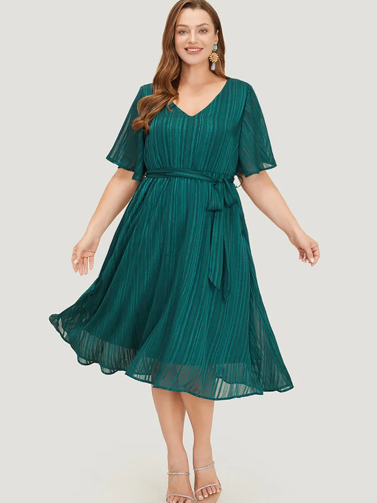 Plain Glitter Pocket Belt Ruffle Hem Dress sold by Bloomchic