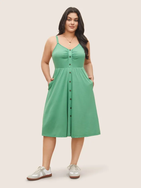 Solid Ruched Button Detail Adjustable Straps Dress sold by Bloomchic