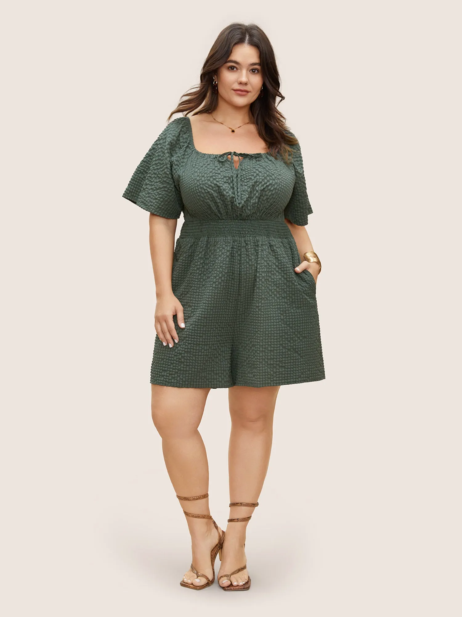 Plisse Shirred Pocket Knot Neck Romper sold by Bloomchic