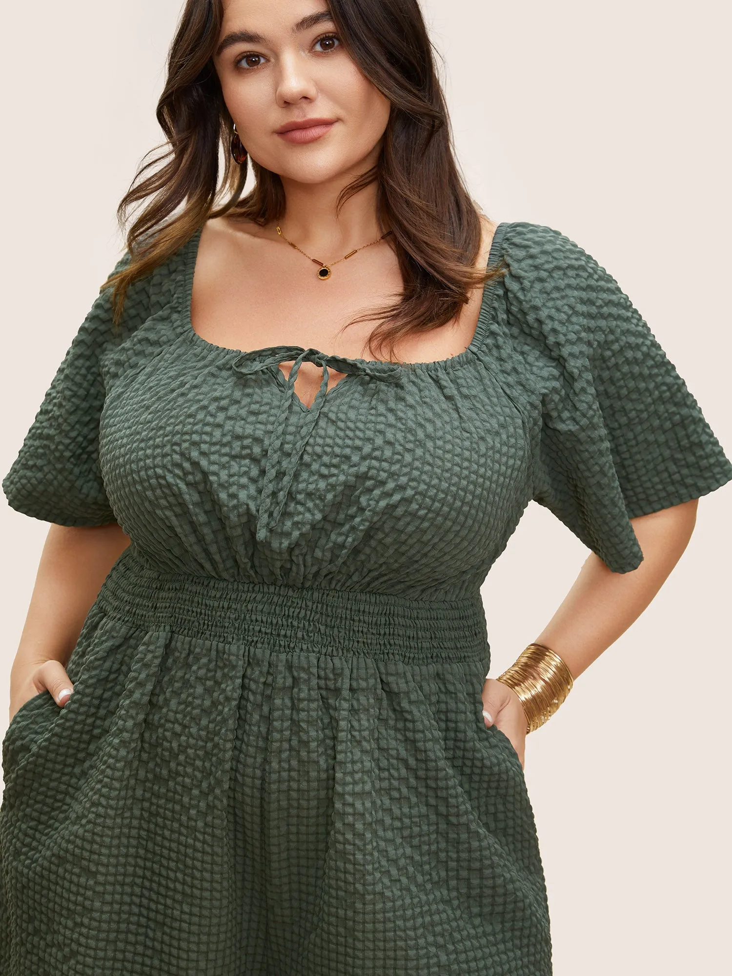 Plisse Shirred Pocket Knot Neck Romper sold by Bloomchic product image thumbnail 4