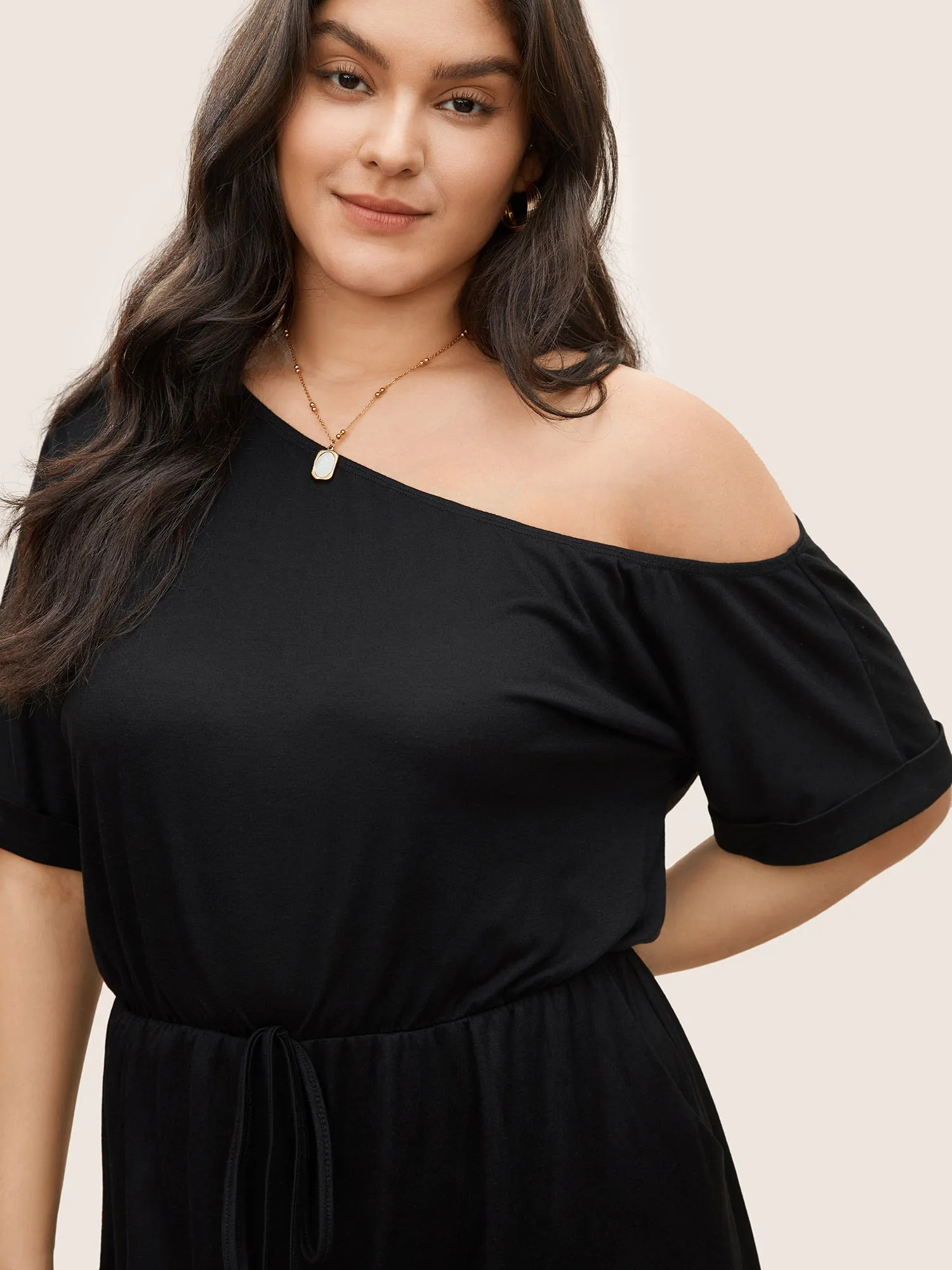 Plain One Shoulder Cuffed Sleeve Ties Romper sold by Bloomchic product image thumbnail 4
