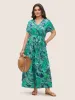 Tropical Print Button Up Belted Jumpsuit sold by Bloomchic