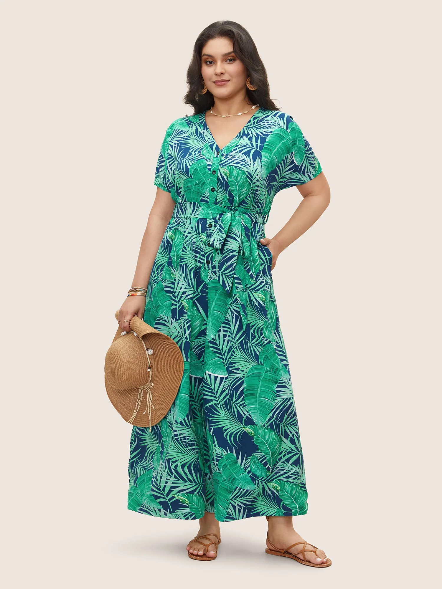 Tropical Print Button Up Belted Jumpsuit sold by Bloomchic