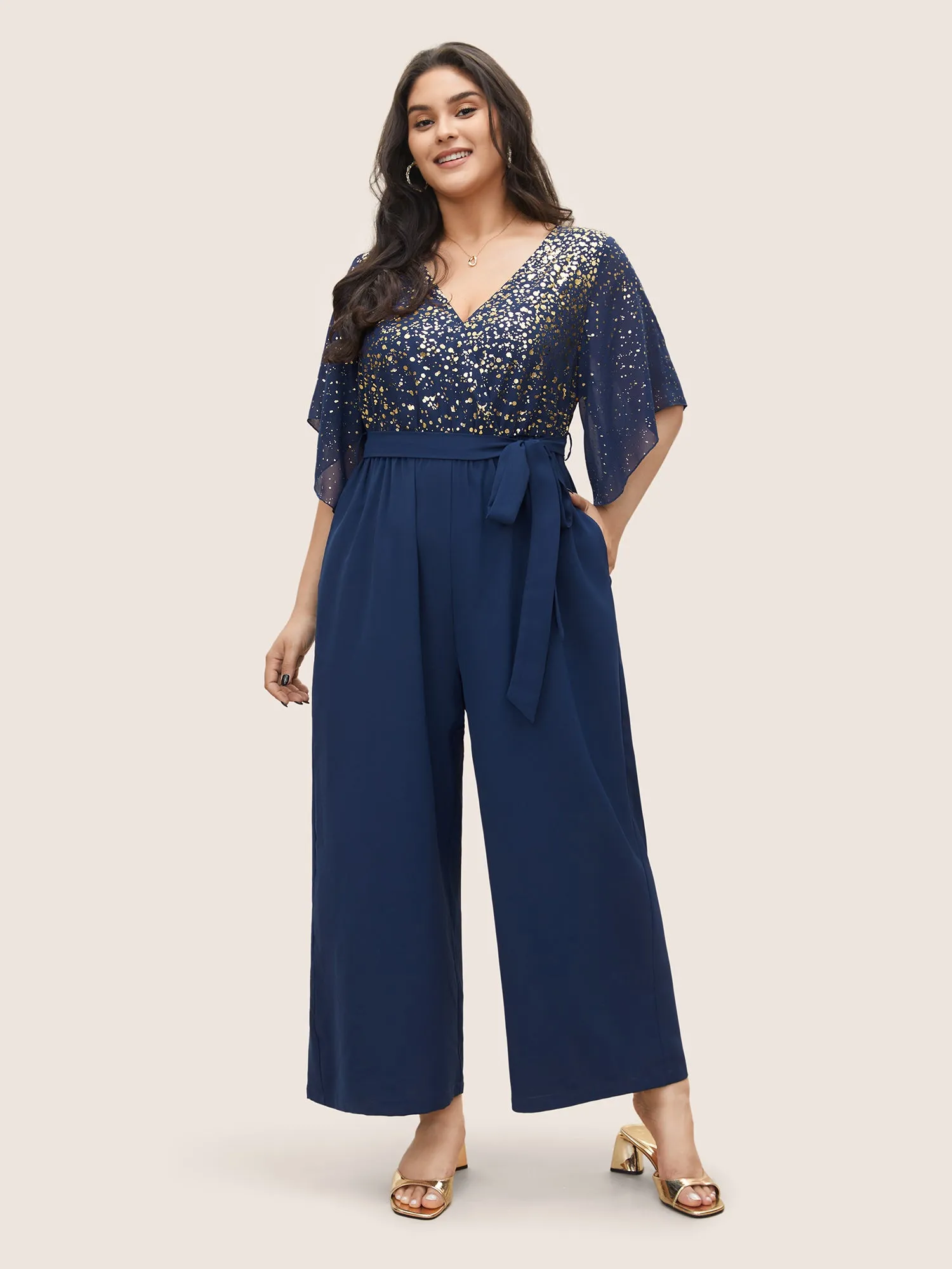 Glitter Overlap Collar Mesh Flutter Sleeve Jumpsuit sold by Bloomchic product image thumbnail 2