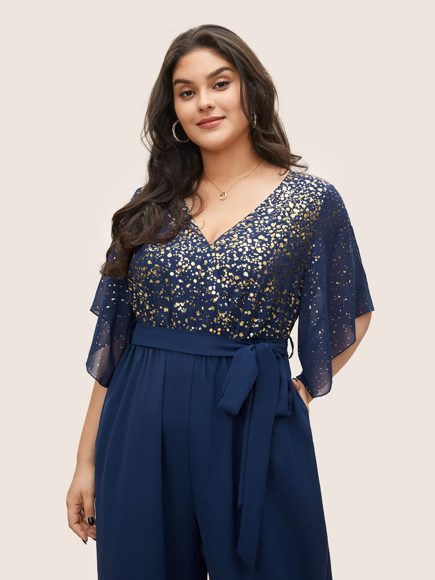 Glitter Overlap Collar Mesh Flutter Sleeve Jumpsuit sold by Bloomchic product image thumbnail 4